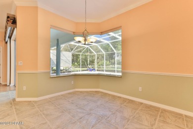 Pristine condition move in ready. Pool home on the Golf Course on Halifax Plantation Golf Club in Florida - for sale on GolfHomes.com, golf home, golf lot