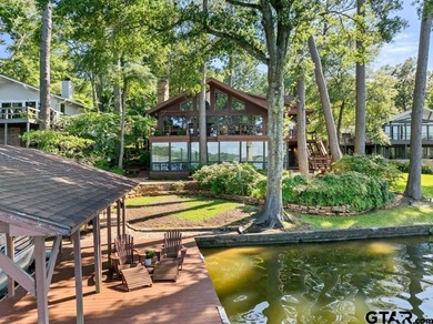 Enjoy breathtaking lake views from nearly every room in this on Hide-A-Way Lake Golf Course in Texas - for sale on GolfHomes.com, golf home, golf lot