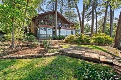 Enjoy breathtaking lake views from nearly every room in this on Hide-A-Way Lake Golf Course in Texas - for sale on GolfHomes.com, golf home, golf lot