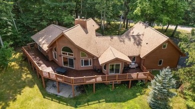 This home reflects a deep appreciation for quality and comfort on Cedar River Golf Course in Michigan - for sale on GolfHomes.com, golf home, golf lot