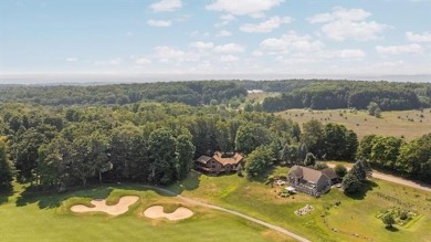 This home reflects a deep appreciation for quality and comfort on Cedar River Golf Course in Michigan - for sale on GolfHomes.com, golf home, golf lot