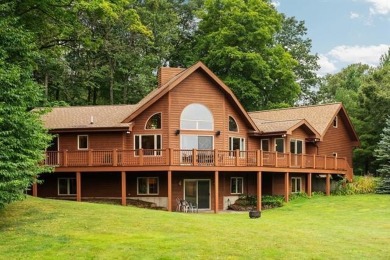 This home reflects a deep appreciation for quality and comfort on Cedar River Golf Course in Michigan - for sale on GolfHomes.com, golf home, golf lot
