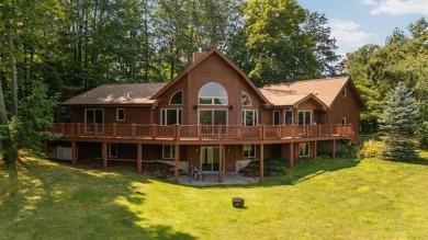 This home reflects a deep appreciation for quality and comfort on Cedar River Golf Course in Michigan - for sale on GolfHomes.com, golf home, golf lot