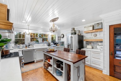 Nostalgic Myrtle Beach Cottage with Modern Upgrades  Step back on Whispering Pines in South Carolina - for sale on GolfHomes.com, golf home, golf lot