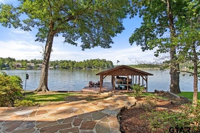 Enjoy breathtaking lake views from nearly every room in this on Hide-A-Way Lake Golf Course in Texas - for sale on GolfHomes.com, golf home, golf lot