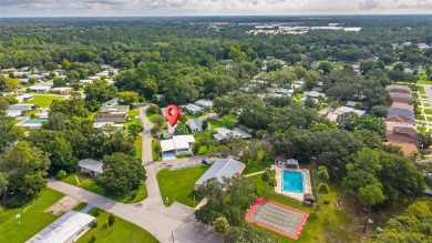 One or more photo(s) has been virtually staged. Corner-Lot Home on Country Club of Mount Dora in Florida - for sale on GolfHomes.com, golf home, golf lot