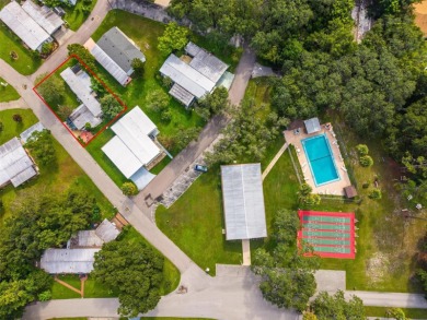 One or more photo(s) has been virtually staged. Corner-Lot Home on Country Club of Mount Dora in Florida - for sale on GolfHomes.com, golf home, golf lot