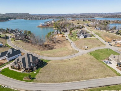 Beautiful mostly level, water view homesite near the Marina in on Wind River Golf Course in Tennessee - for sale on GolfHomes.com, golf home, golf lot