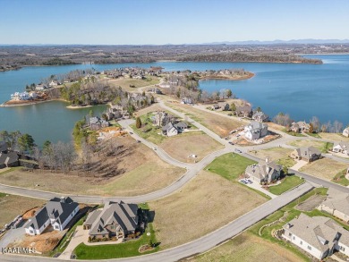 Beautiful mostly level, water view homesite near the Marina in on Wind River Golf Course in Tennessee - for sale on GolfHomes.com, golf home, golf lot