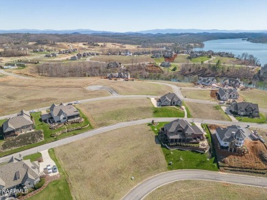 Beautiful mostly level, water view homesite near the Marina in on Wind River Golf Course in Tennessee - for sale on GolfHomes.com, golf home, golf lot