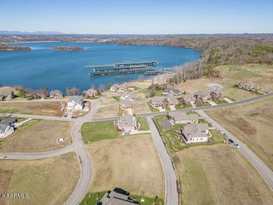 Beautiful mostly level, water view homesite near the Marina in on Wind River Golf Course in Tennessee - for sale on GolfHomes.com, golf home, golf lot