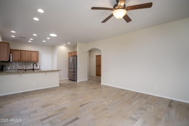 Welcome to this cozy unit with warm welcoming wood finished tile on Sunland Springs Golf Course  in Arizona - for sale on GolfHomes.com, golf home, golf lot