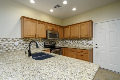 Welcome to this cozy unit with warm welcoming wood finished tile on Sunland Springs Golf Course  in Arizona - for sale on GolfHomes.com, golf home, golf lot