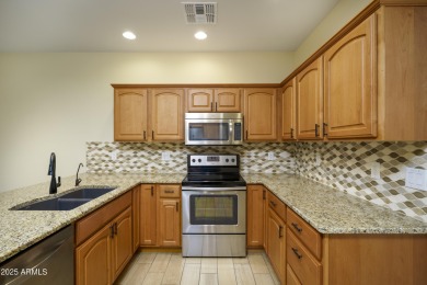 Welcome to this cozy unit with warm welcoming wood finished tile on Sunland Springs Golf Course  in Arizona - for sale on GolfHomes.com, golf home, golf lot