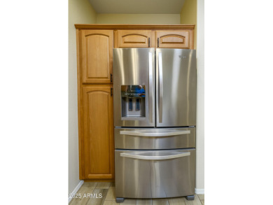 Welcome to this cozy unit with warm welcoming wood finished tile on Sunland Springs Golf Course  in Arizona - for sale on GolfHomes.com, golf home, golf lot
