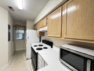 Second floor two bedroom end unit over looking the 6th hole of on Aberdeen Golf and Country Club in South Carolina - for sale on GolfHomes.com, golf home, golf lot