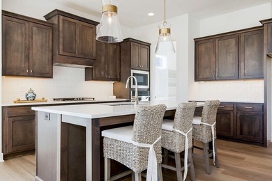 BRAND NEW ELEVATION FOR THIS 3-CAR HUDSON WITH A CONTEMPORY on Heritage Park Golf Course in Kansas - for sale on GolfHomes.com, golf home, golf lot