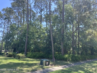 GOLF COURSE View Lot! A beautiful lot with several mature trees on St. Augustine Shores Golf Club in Florida - for sale on GolfHomes.com, golf home, golf lot
