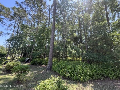 GOLF COURSE View Lot! A beautiful lot with several mature trees on St. Augustine Shores Golf Club in Florida - for sale on GolfHomes.com, golf home, golf lot