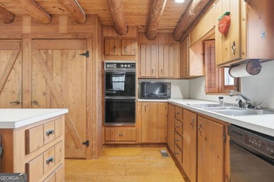 This Authentic Log Cabin Kept in It's Original Condition on The Highlands Course at Lake Arrowhead in Georgia - for sale on GolfHomes.com, golf home, golf lot