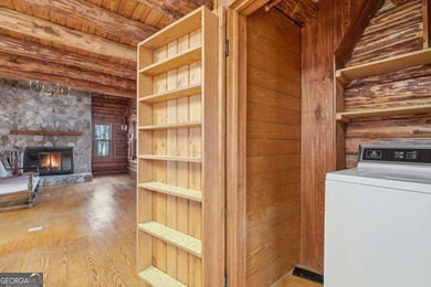 This Authentic Log Cabin Kept in It's Original Condition on The Highlands Course at Lake Arrowhead in Georgia - for sale on GolfHomes.com, golf home, golf lot