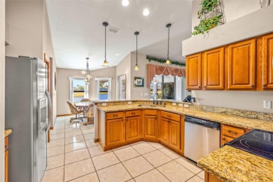 Imagine starting your day enjoying your coffee while watching on Tampa Bay Golf and Country Club in Florida - for sale on GolfHomes.com, golf home, golf lot