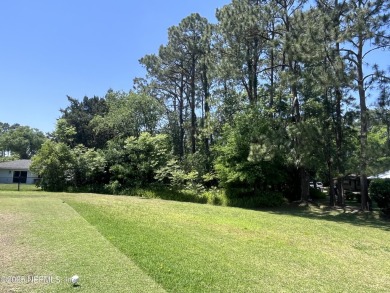GOLF COURSE View Lot! A beautiful lot with several mature trees on St. Augustine Shores Golf Club in Florida - for sale on GolfHomes.com, golf home, golf lot