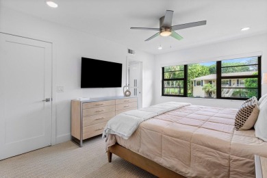 This contemporary townhouse, updated in 2022, effortlessly on Hunters Run Golf and Country Club in Florida - for sale on GolfHomes.com, golf home, golf lot