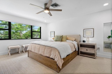 This contemporary townhouse, updated in 2022, effortlessly on Hunters Run Golf and Country Club in Florida - for sale on GolfHomes.com, golf home, golf lot