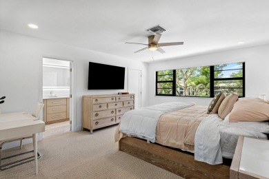 This contemporary townhouse, updated in 2022, effortlessly on Hunters Run Golf and Country Club in Florida - for sale on GolfHomes.com, golf home, golf lot