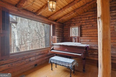 This Authentic Log Cabin Kept in It's Original Condition on The Highlands Course at Lake Arrowhead in Georgia - for sale on GolfHomes.com, golf home, golf lot