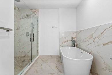 This contemporary townhouse, updated in 2022, effortlessly on Hunters Run Golf and Country Club in Florida - for sale on GolfHomes.com, golf home, golf lot