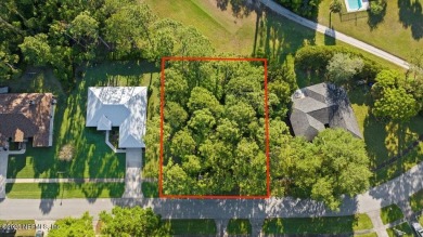GOLF COURSE View Lot! A beautiful lot with several mature trees on St. Augustine Shores Golf Club in Florida - for sale on GolfHomes.com, golf home, golf lot