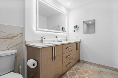This contemporary townhouse, updated in 2022, effortlessly on Hunters Run Golf and Country Club in Florida - for sale on GolfHomes.com, golf home, golf lot