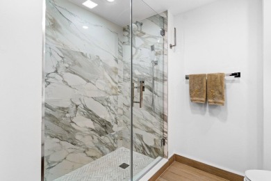 This contemporary townhouse, updated in 2022, effortlessly on Hunters Run Golf and Country Club in Florida - for sale on GolfHomes.com, golf home, golf lot
