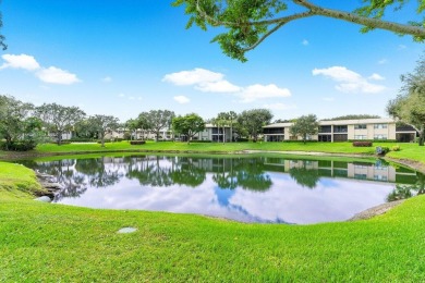 This contemporary townhouse, updated in 2022, effortlessly on Hunters Run Golf and Country Club in Florida - for sale on GolfHomes.com, golf home, golf lot