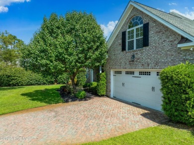 Discover refined Southern living in this meticulously crafted 2 on Members Club At St. James Plantation in North Carolina - for sale on GolfHomes.com, golf home, golf lot