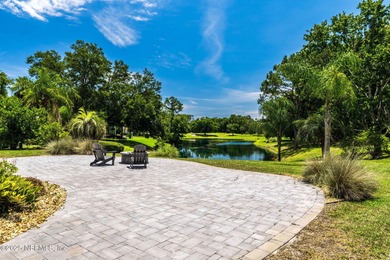 Experience luxury & tranquility in this stunning single-story on Magnolia Point Golf and Country Club in Florida - for sale on GolfHomes.com, golf home, golf lot