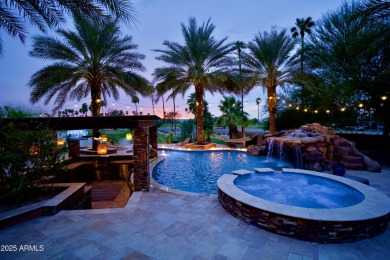 This tropical backyard oasis is a true showstopper! An oversized on Kokopelli Golf Course in Arizona - for sale on GolfHomes.com, golf home, golf lot