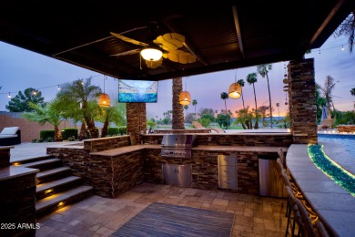 This tropical backyard oasis is a true showstopper! An oversized on Kokopelli Golf Course in Arizona - for sale on GolfHomes.com, golf home, golf lot