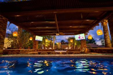 This tropical backyard oasis is a true showstopper! An oversized on Kokopelli Golf Course in Arizona - for sale on GolfHomes.com, golf home, golf lot