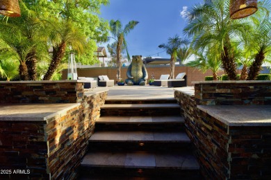 This tropical backyard oasis is a true showstopper! An oversized on Kokopelli Golf Course in Arizona - for sale on GolfHomes.com, golf home, golf lot