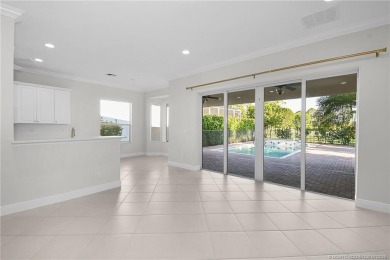 Beautiful and move-in ready CBS one-story pool home is privately on Eagle Marsh Golf Club in Florida - for sale on GolfHomes.com, golf home, golf lot