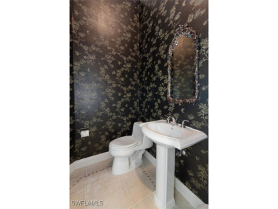 This STUNNING home in the highly sought-after Gateway community on Gateway Golf and Country Club in Florida - for sale on GolfHomes.com, golf home, golf lot
