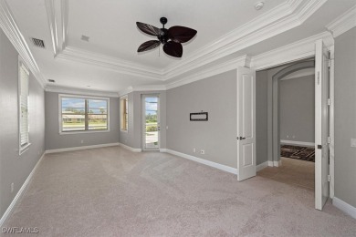This STUNNING home in the highly sought-after Gateway community on Gateway Golf and Country Club in Florida - for sale on GolfHomes.com, golf home, golf lot