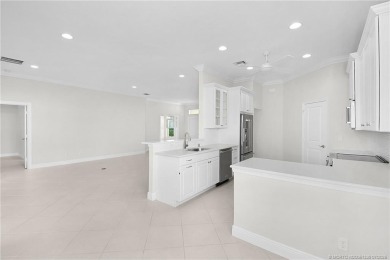 Beautiful and move-in ready CBS one-story pool home is privately on Eagle Marsh Golf Club in Florida - for sale on GolfHomes.com, golf home, golf lot