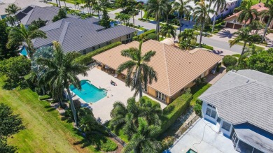 Beautifully appointed, welcoming home with split bedrooms and on Bocaire Country Club in Florida - for sale on GolfHomes.com, golf home, golf lot