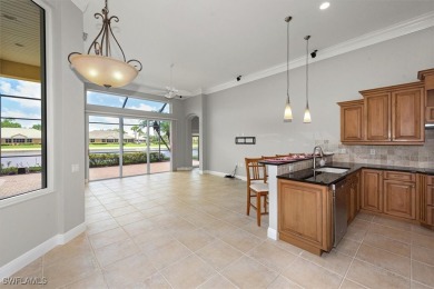 This STUNNING home in the highly sought-after Gateway community on Gateway Golf and Country Club in Florida - for sale on GolfHomes.com, golf home, golf lot
