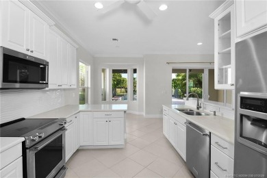Beautiful and move-in ready CBS one-story pool home is privately on Eagle Marsh Golf Club in Florida - for sale on GolfHomes.com, golf home, golf lot
