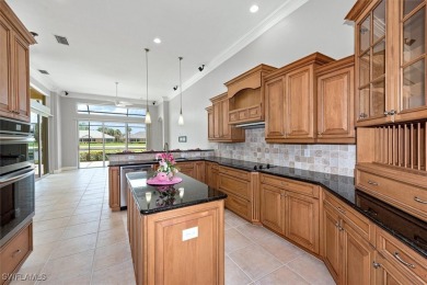 This STUNNING home in the highly sought-after Gateway community on Gateway Golf and Country Club in Florida - for sale on GolfHomes.com, golf home, golf lot